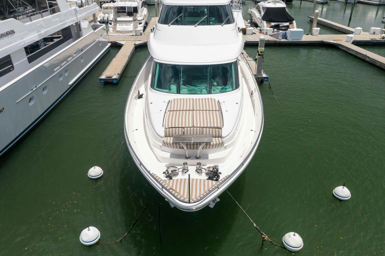 a boat in a harbor aboard ENCORE Yacht for Sale