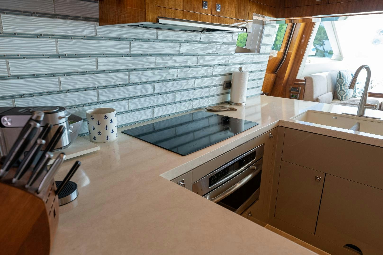 a kitchen with a large sink aboard ENCORE Yacht for Sale