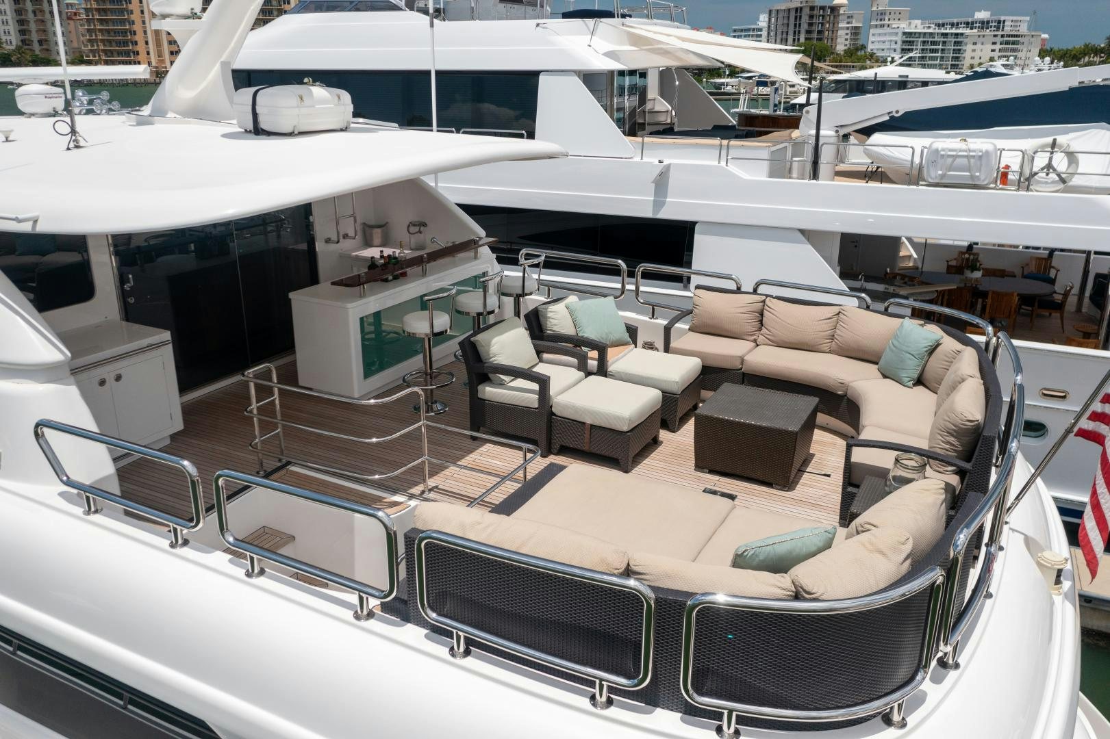 a boat with a couch and chairs aboard ENCORE Yacht for Sale