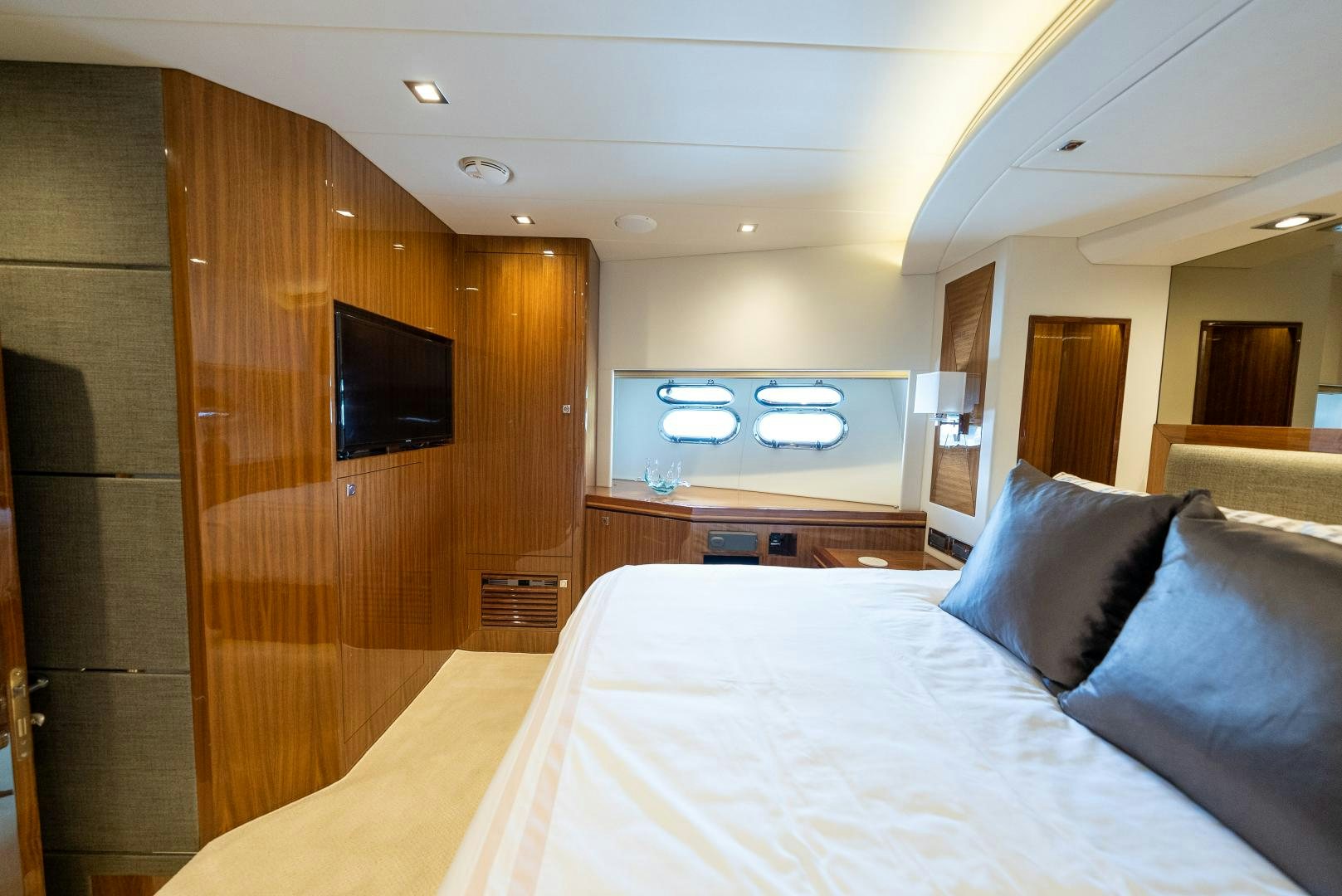 a hotel room with a bed aboard ENCORE Yacht for Sale