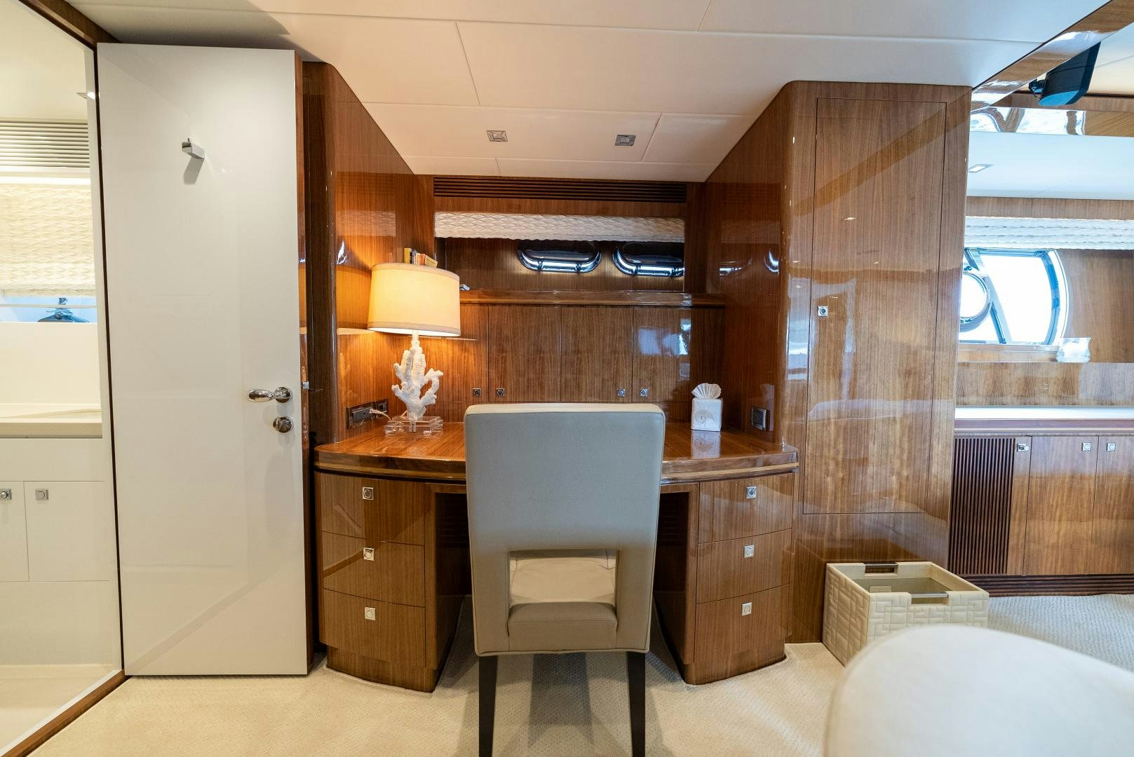a room with a desk and a chair aboard ENCORE Yacht for Sale