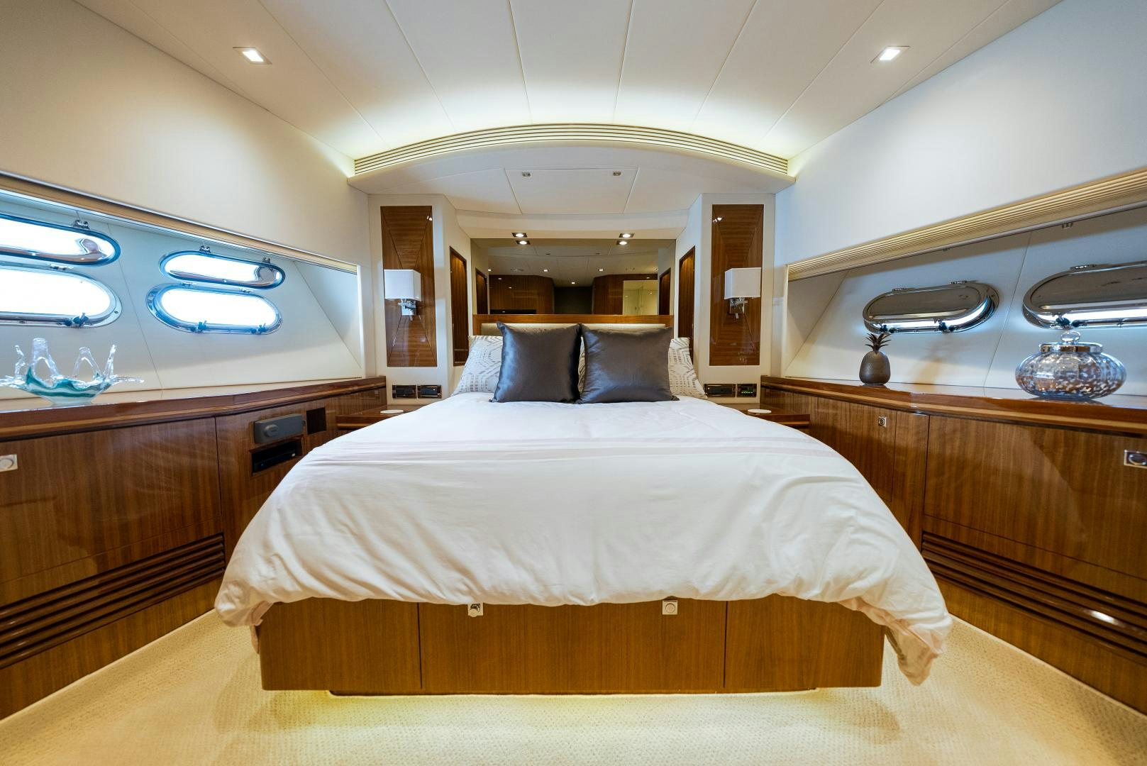 a bed in a room aboard ENCORE Yacht for Sale