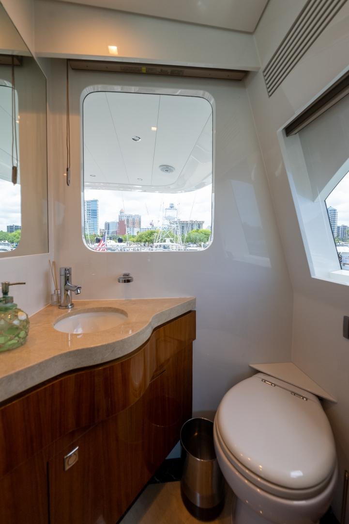 a bathroom with a sink and a toilet aboard ENCORE Yacht for Sale
