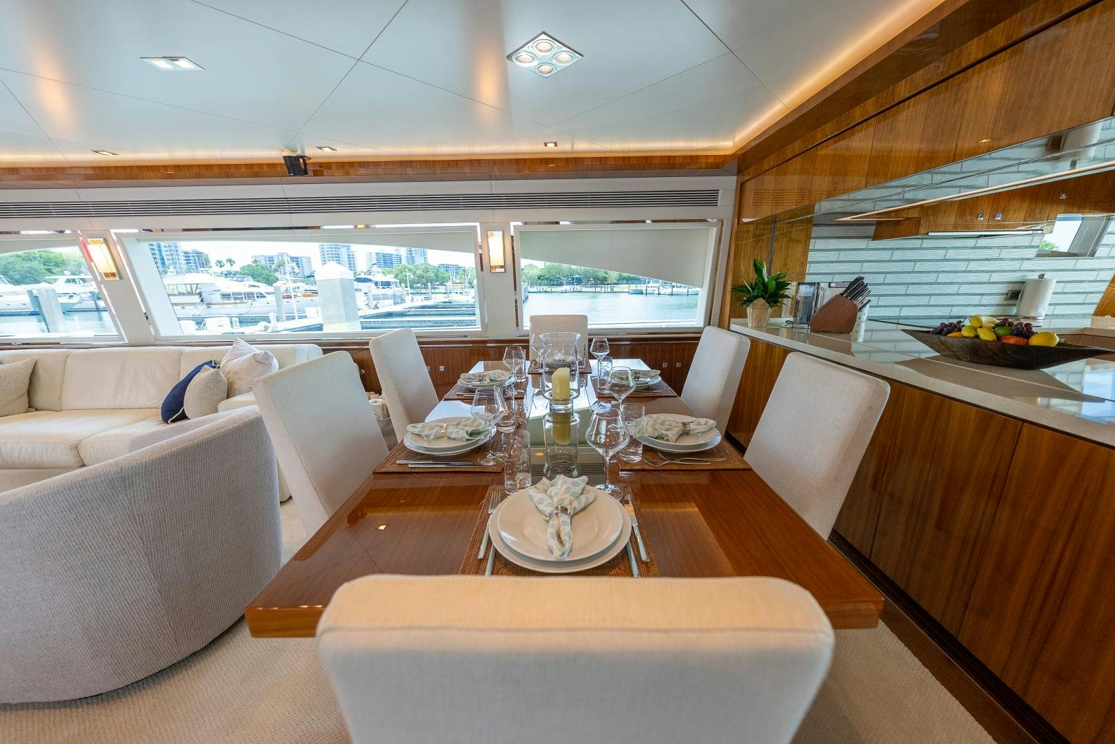 a dining room with a table aboard ENCORE Yacht for Sale