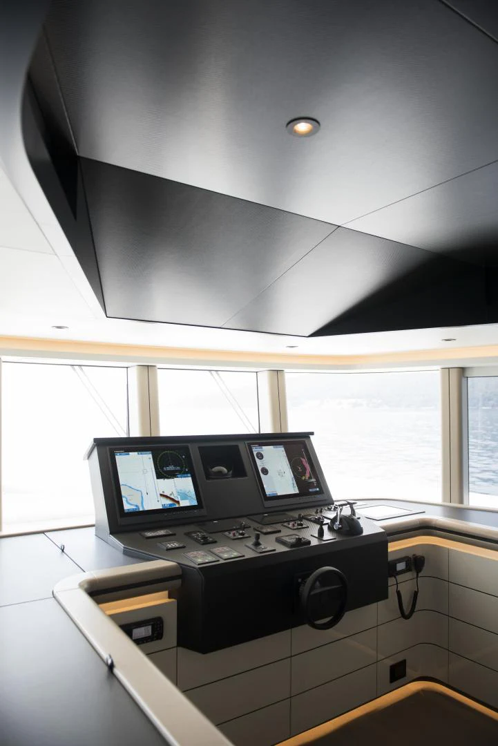 a room with a couple of monitors and a keyboard aboard ALFRESCO 125 Yacht for Sale