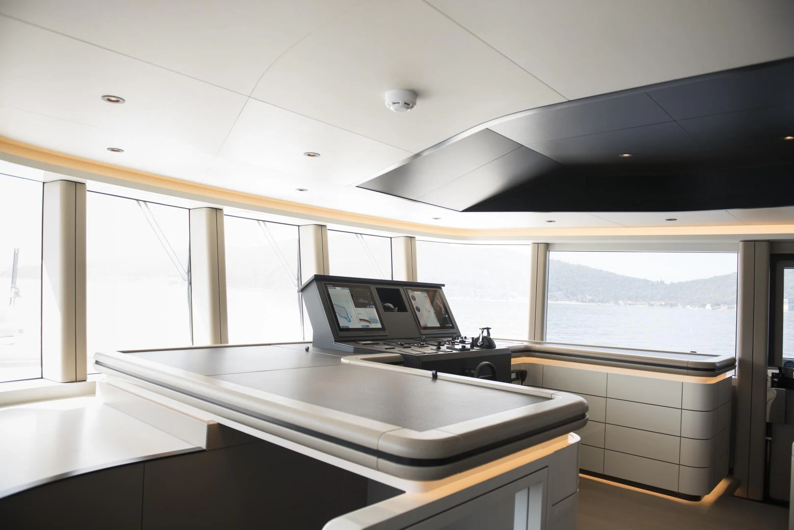 a laptop on a counter aboard ALFRESCO 125 Yacht for Sale