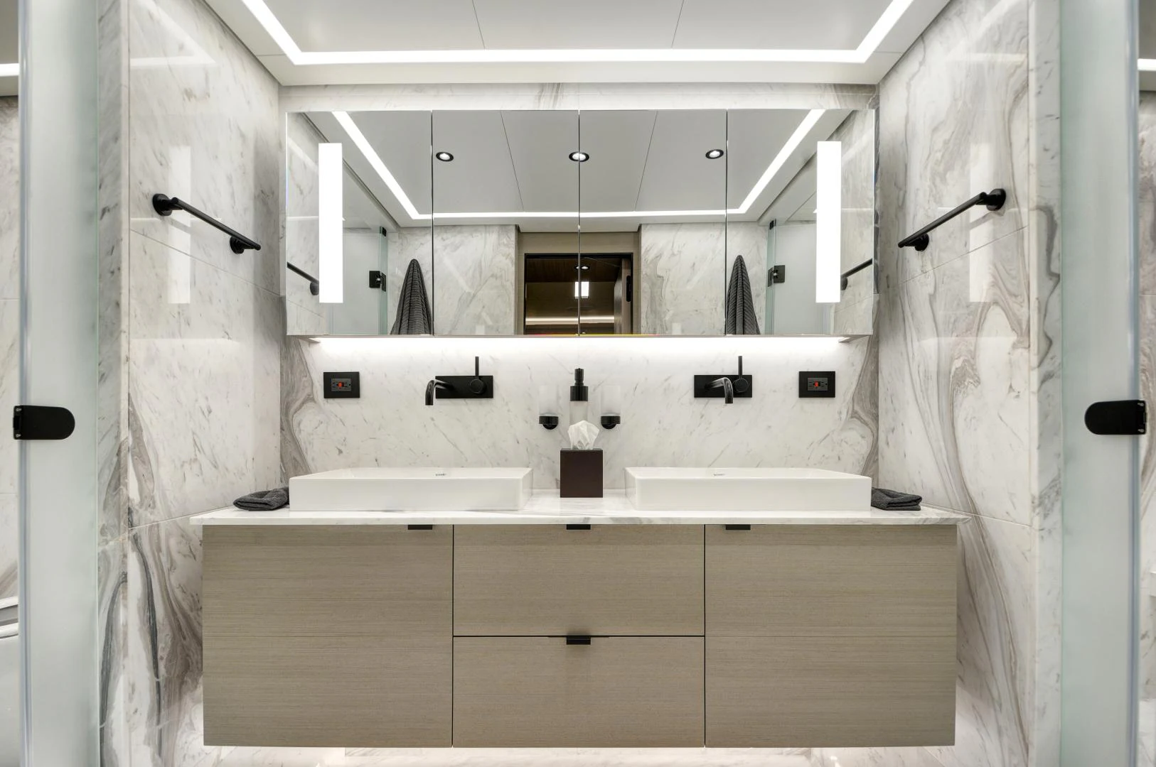 a bathroom with a sink and shower aboard ALFRESCO 125 Yacht for Sale