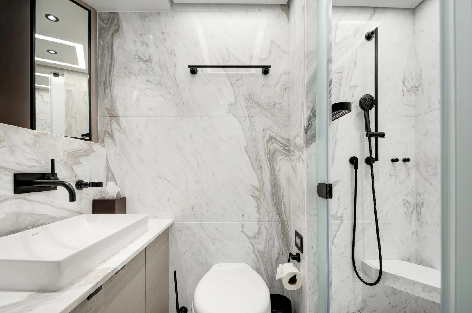 a bathroom with a sink and a toilet aboard ALFRESCO 125 Yacht for Sale