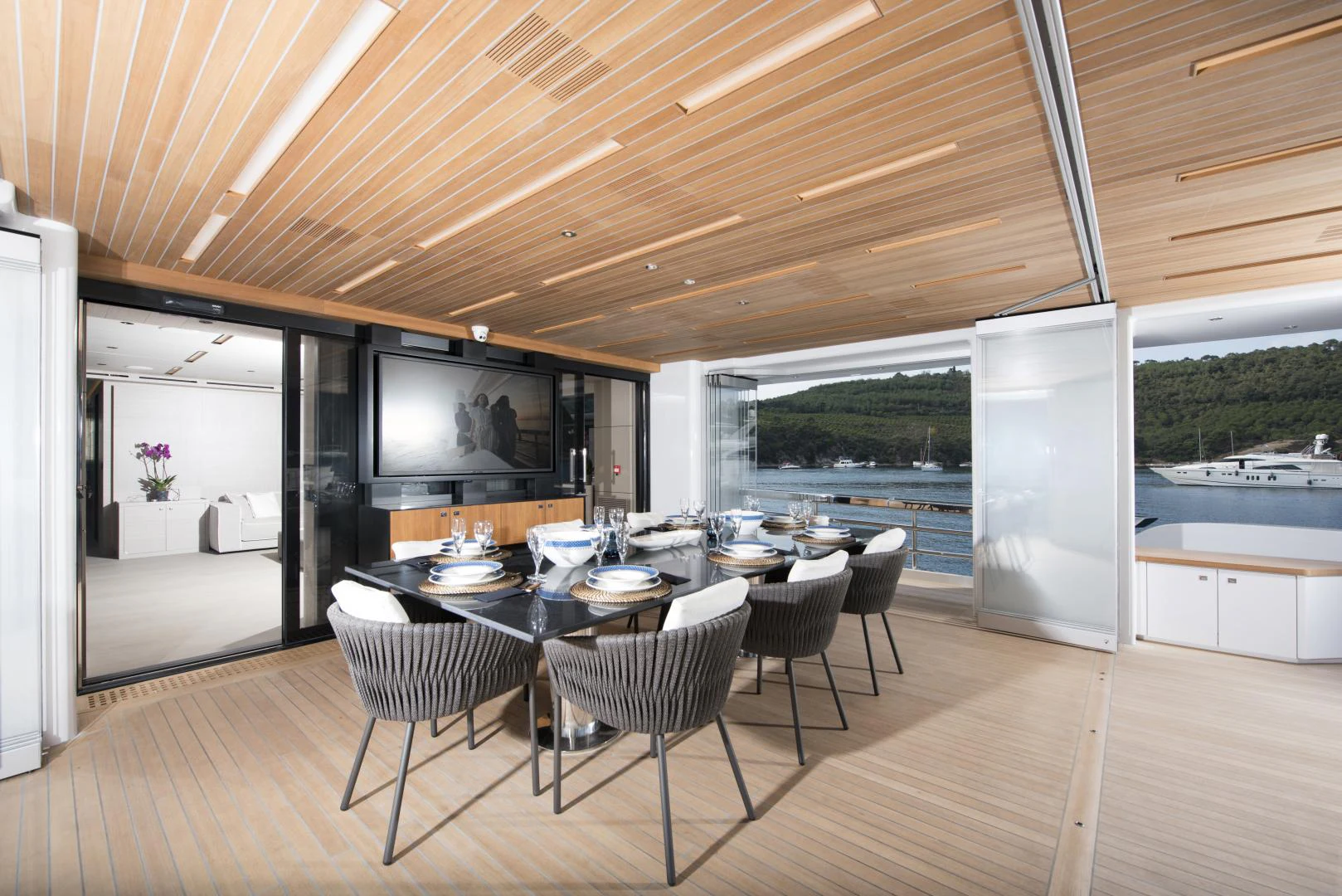 a large open kitchen and dining area aboard ALFRESCO 125 Yacht for Sale