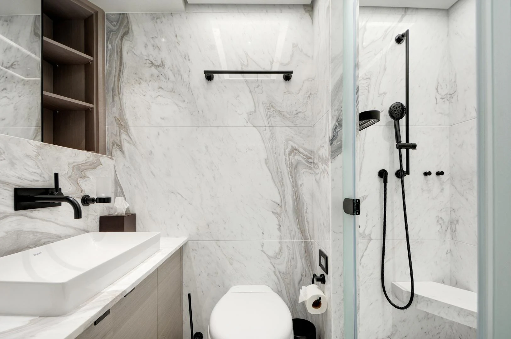 a bathroom with a sink and toilet aboard ALFRESCO 125 Yacht for Sale