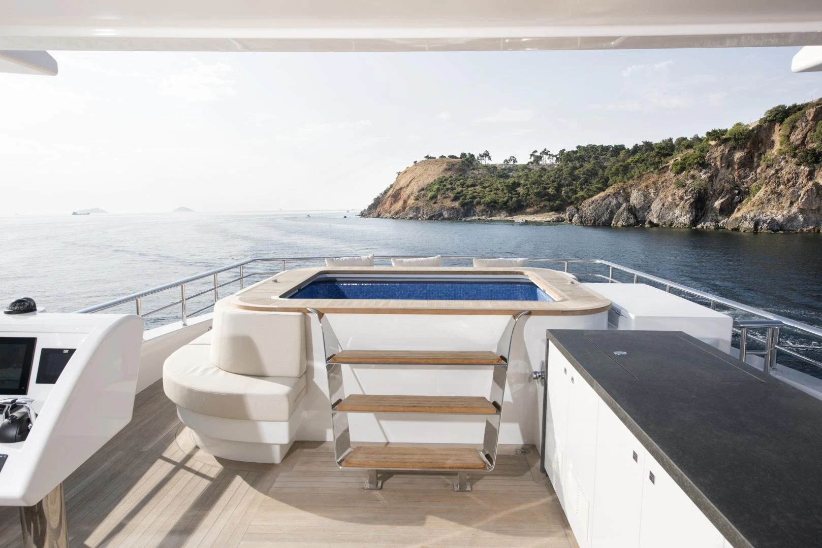 a boat on a deck aboard ALFRESCO 125 Yacht for Sale