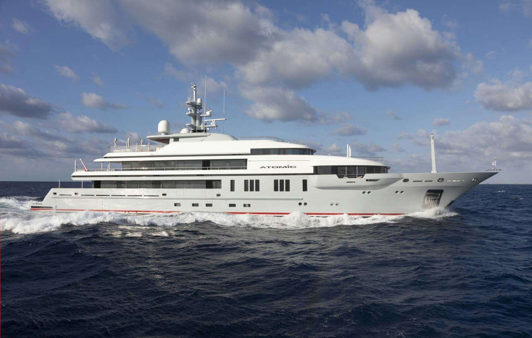 a large white ship in the water aboard ATOMIC Yacht for Sale