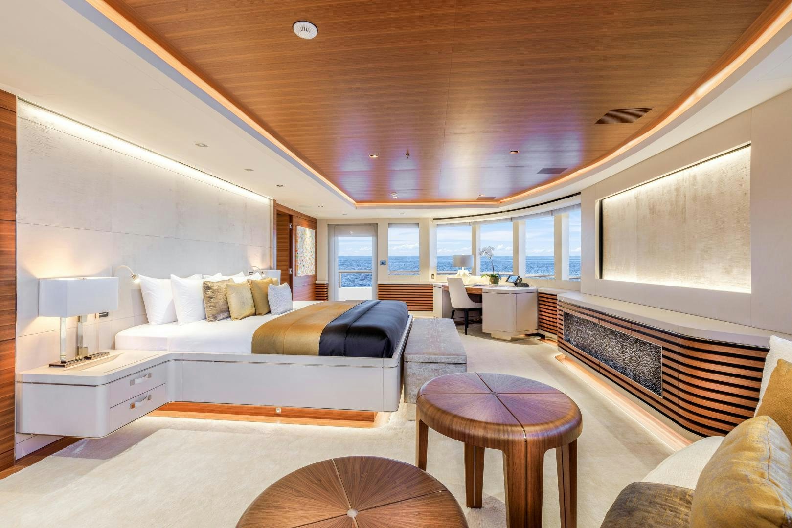 a large bedroom with a large bed aboard ATOMIC Yacht for Sale