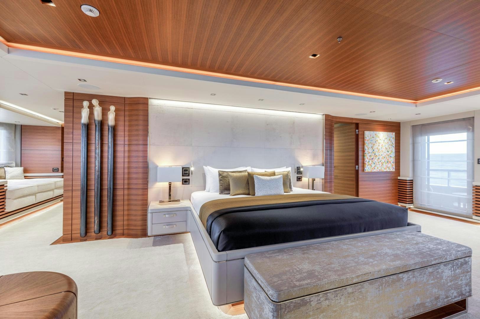 a large bedroom with a large bed aboard ATOMIC Yacht for Sale