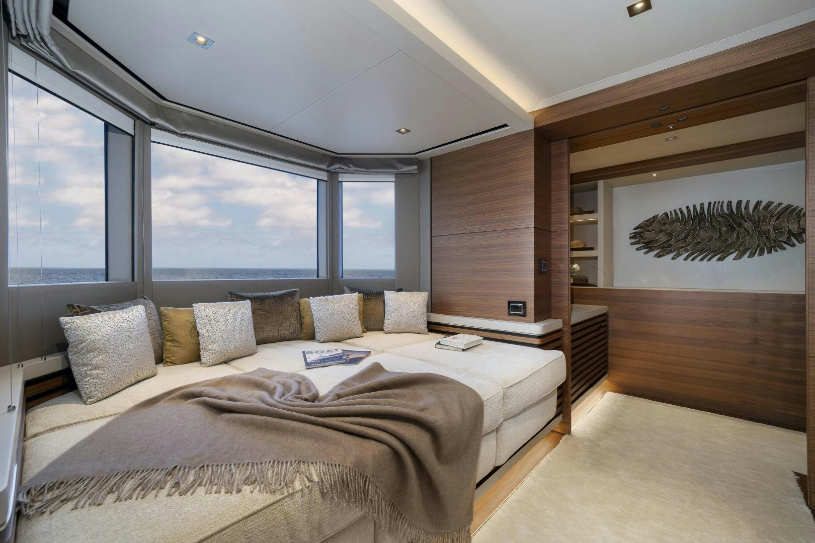 a bed in a room aboard ATOMIC Yacht for Sale