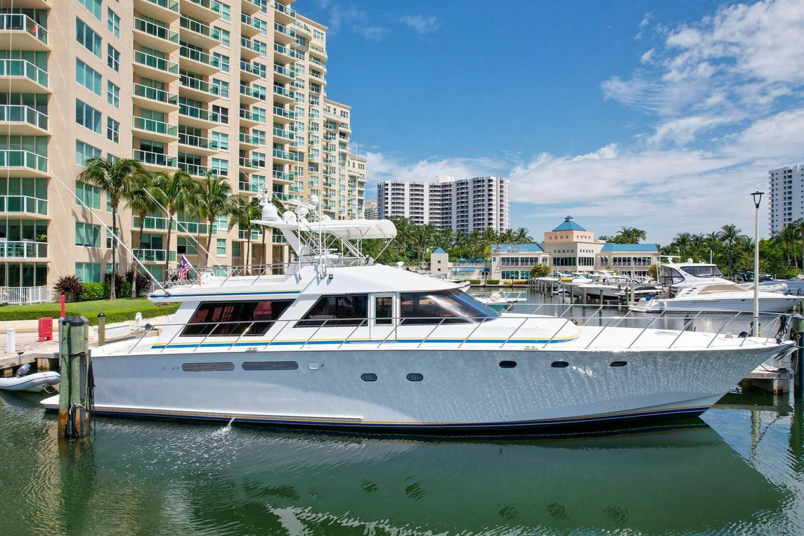 a boat docked at a pier aboard STEALIN TIME Yacht for Sale