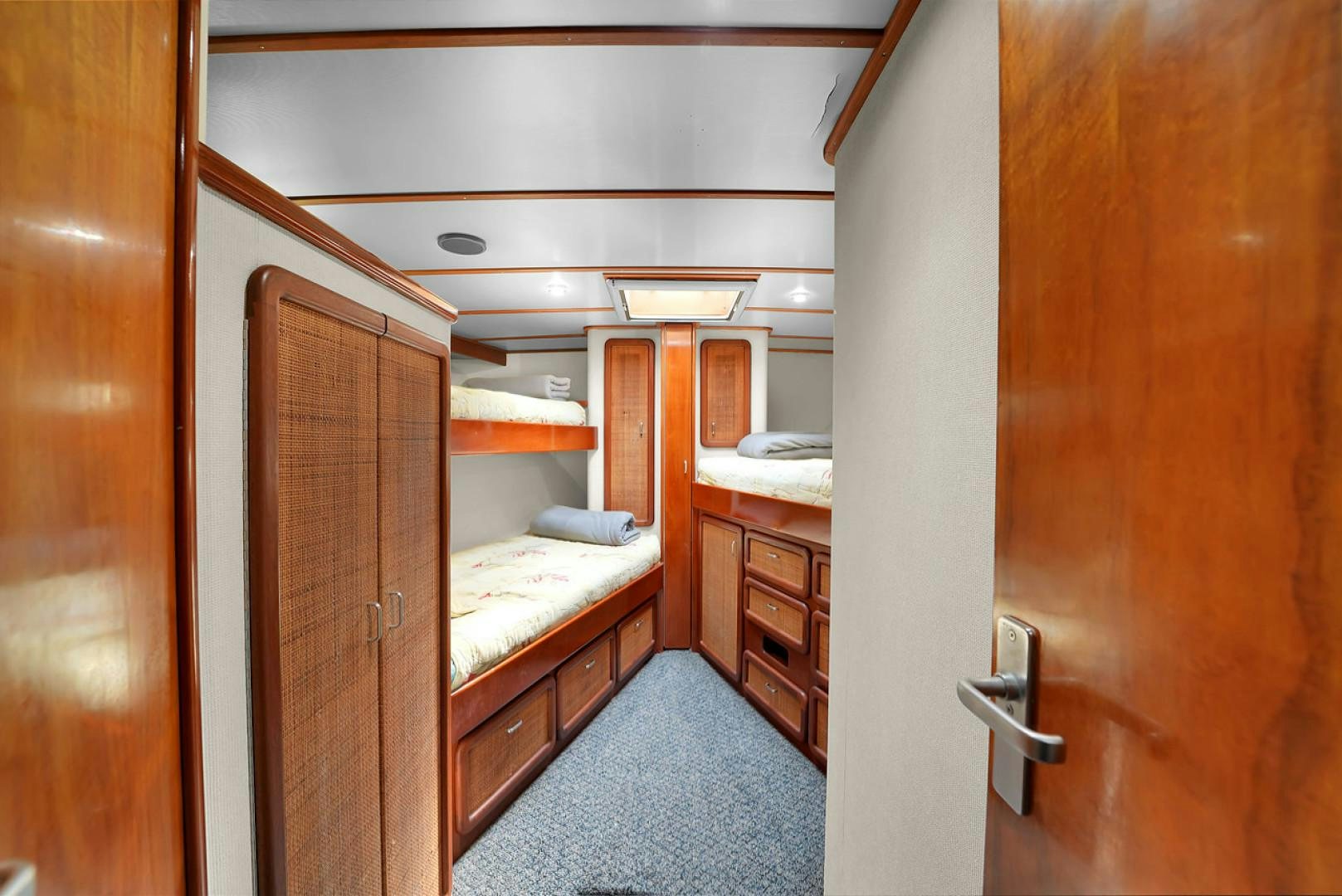 a bathroom with a sink and a mirror aboard STEALIN TIME Yacht for Sale