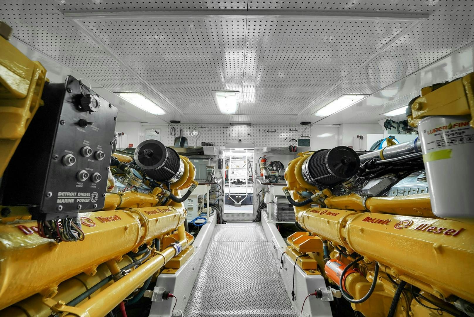 a room full of yellow and black machinery aboard STEALIN TIME Yacht for Sale