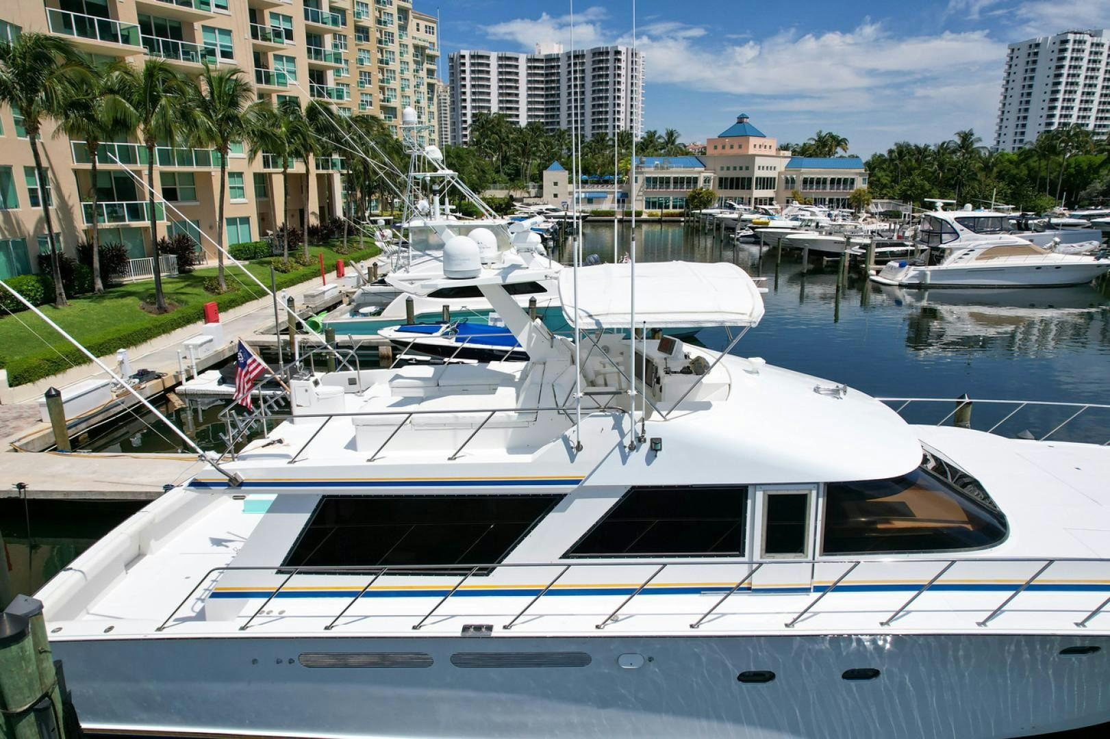 a boat docked at a pier aboard STEALIN TIME Yacht for Sale