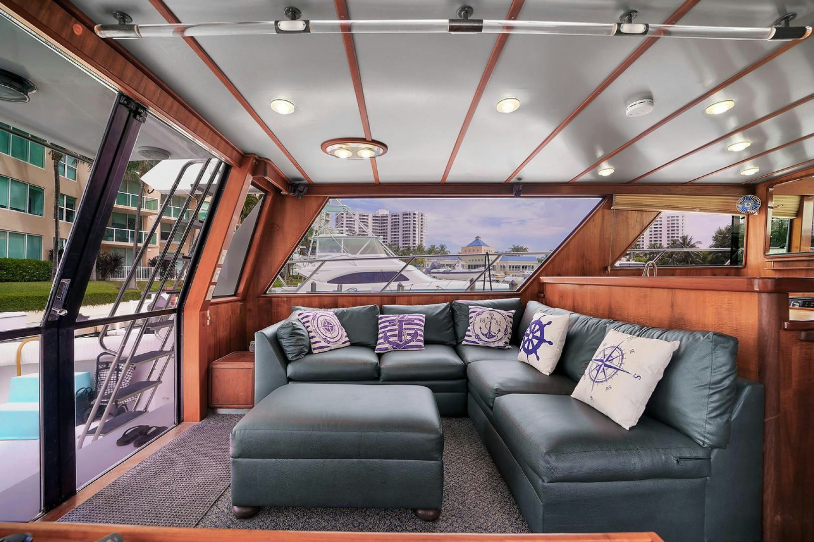 a couch in a train aboard STEALIN TIME Yacht for Sale