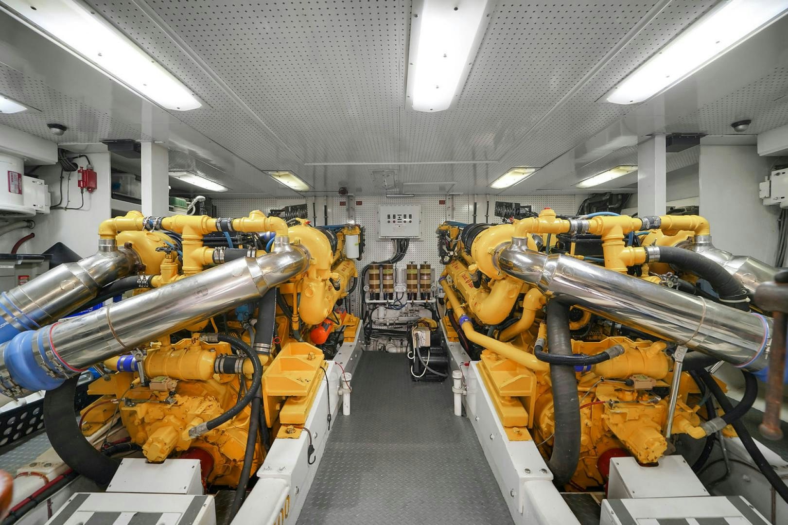 a room full of yellow machinery aboard STEALIN TIME Yacht for Sale
