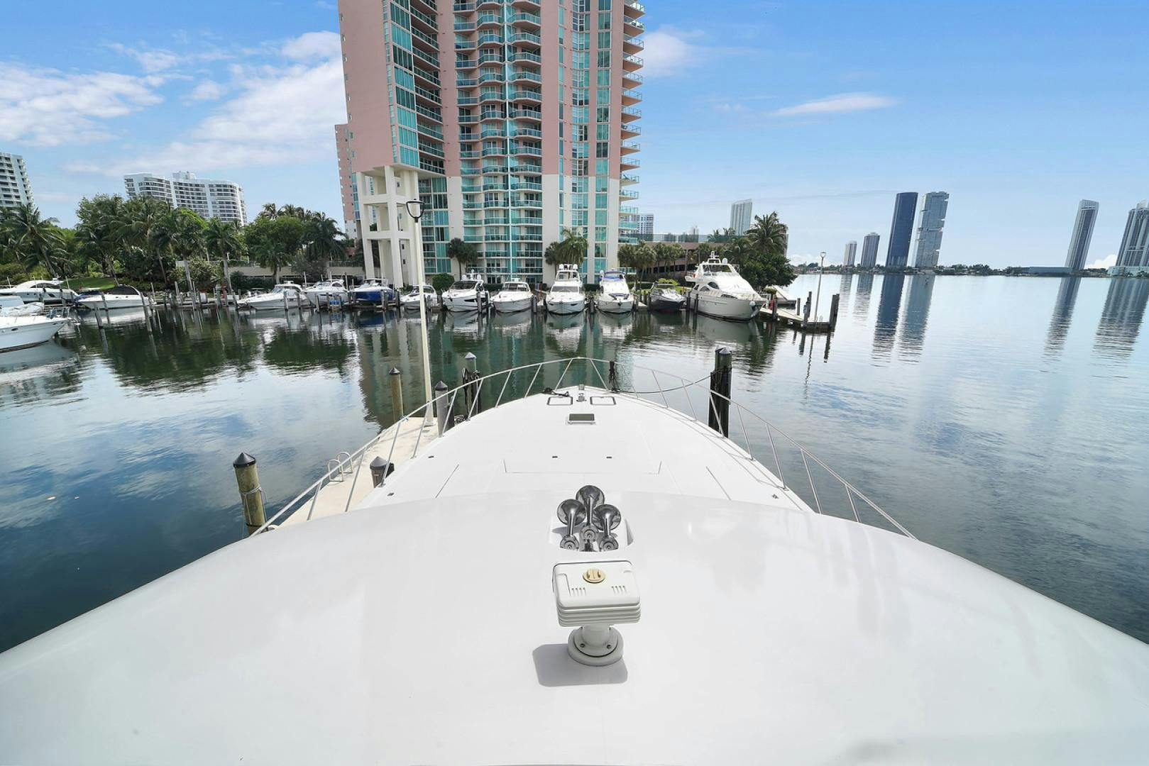 a snowy dock with boats aboard STEALIN TIME Yacht for Sale
