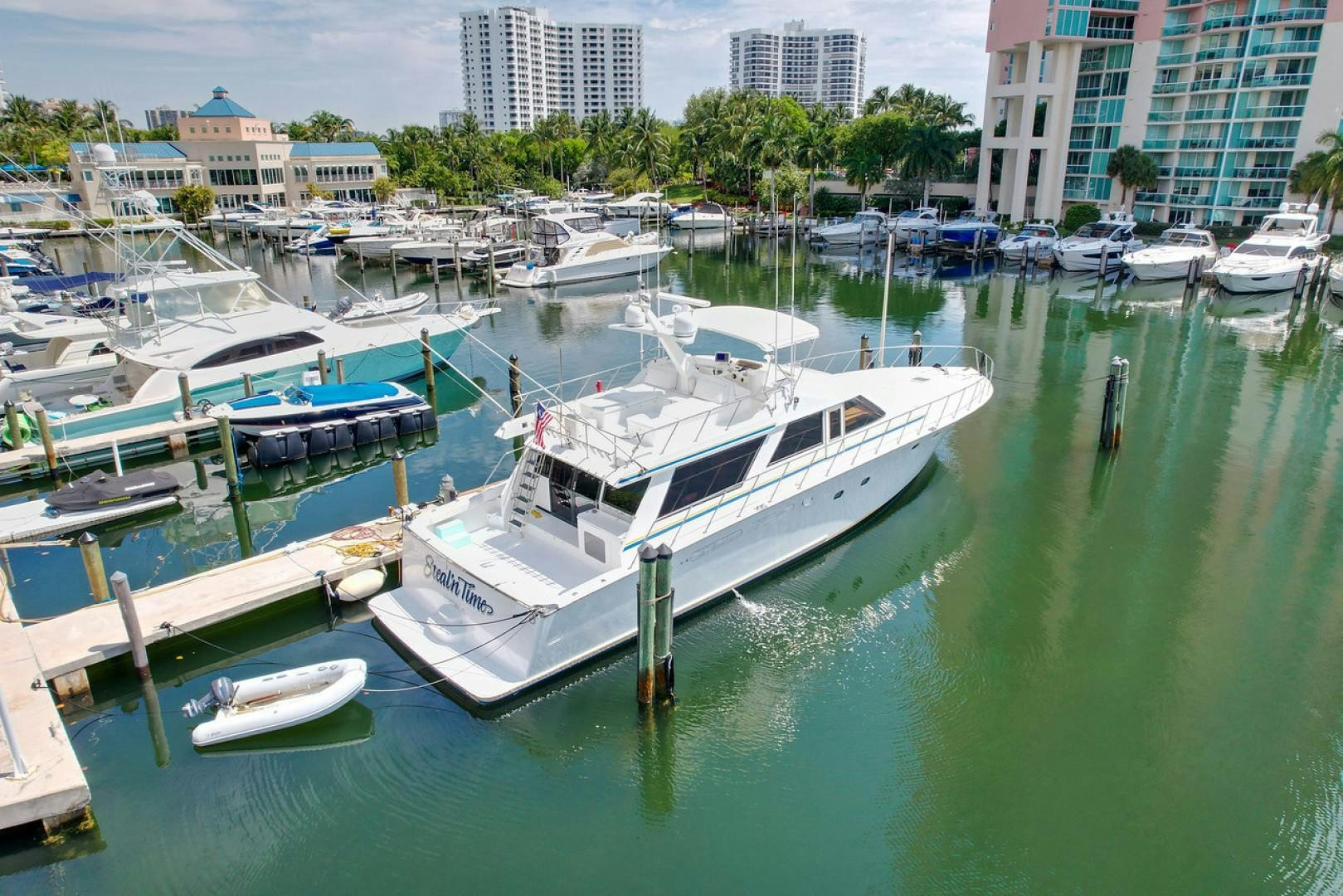 a boat docked at a pier aboard STEALIN TIME Yacht for Sale