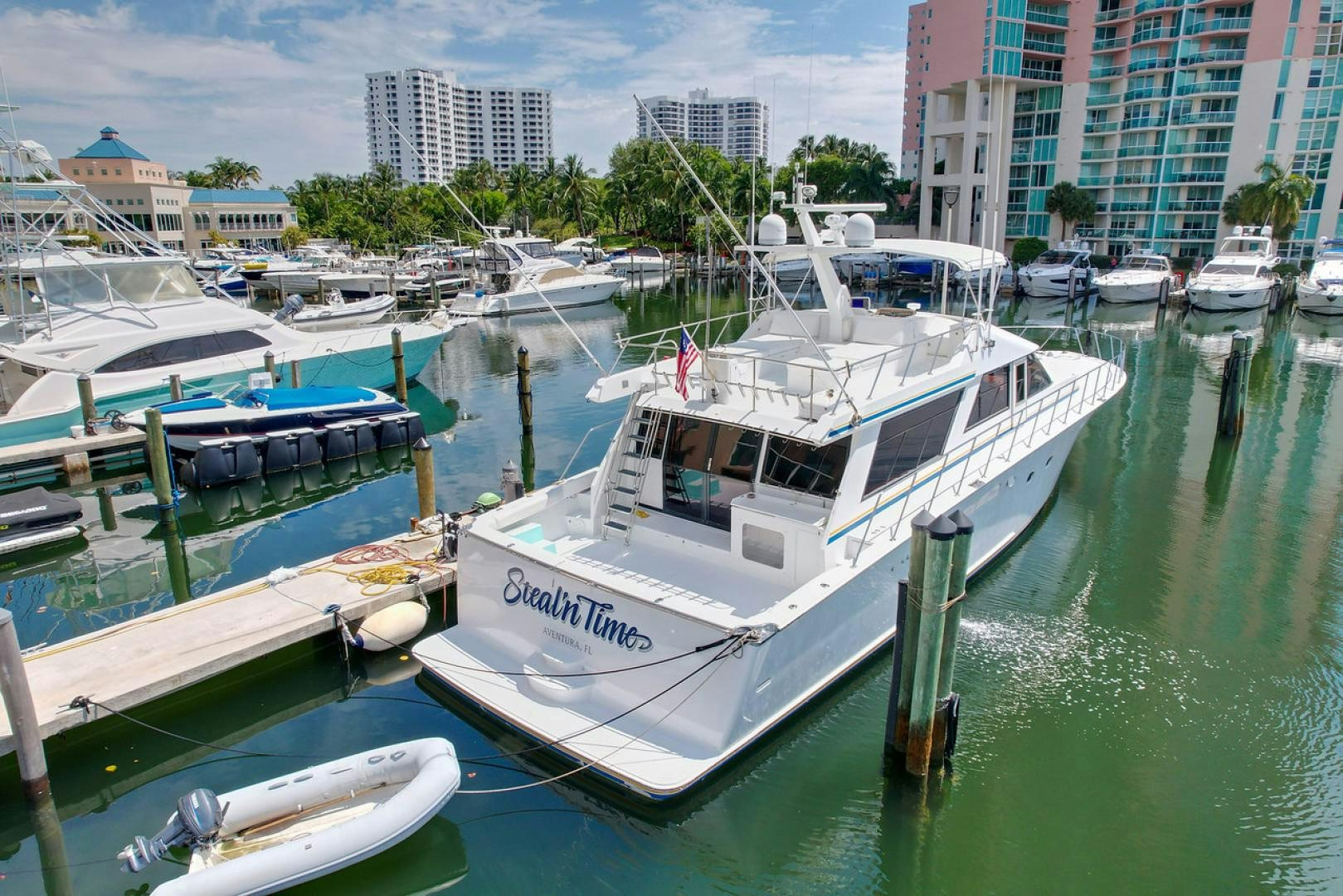a group of boats are parked in a harbor aboard STEALIN TIME Yacht for Sale