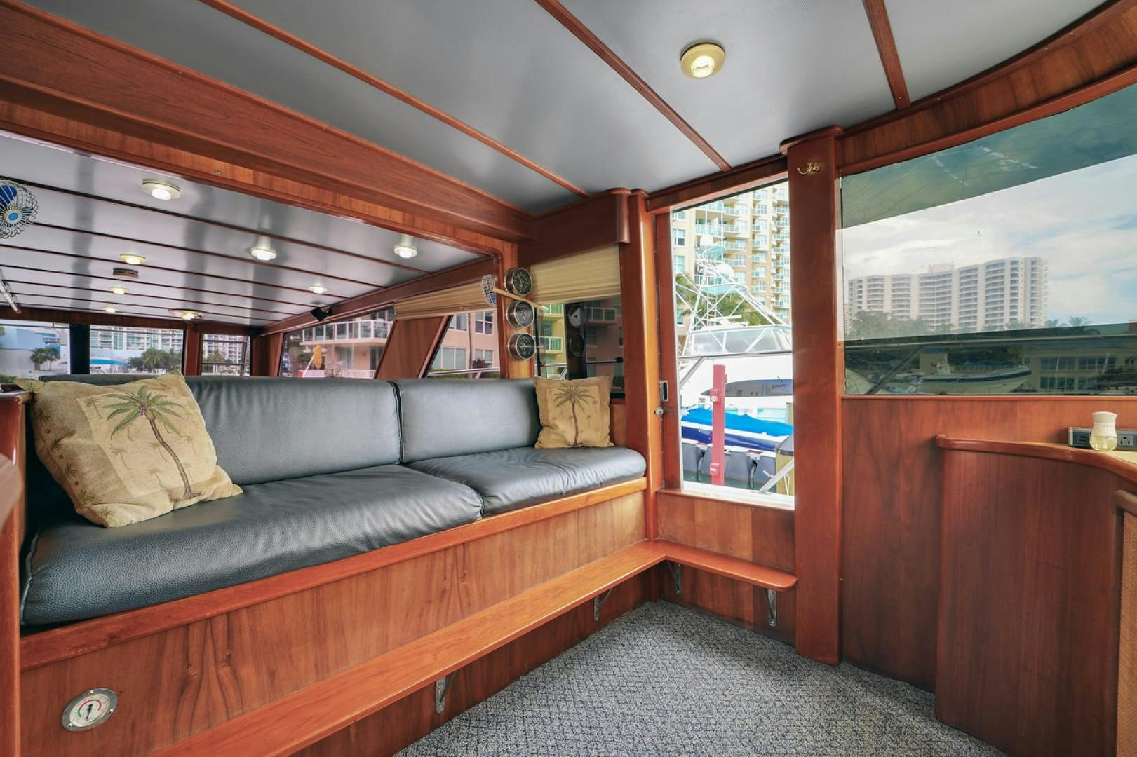 a living room with a couch aboard STEALIN TIME Yacht for Sale