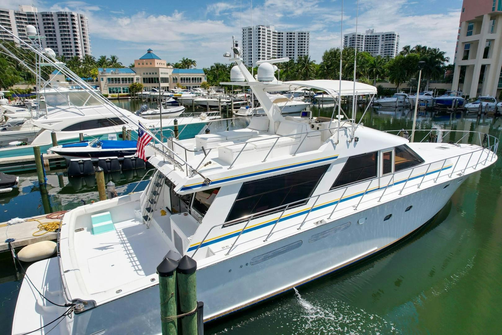 a boat is parked in a harbor aboard STEALIN TIME Yacht for Sale