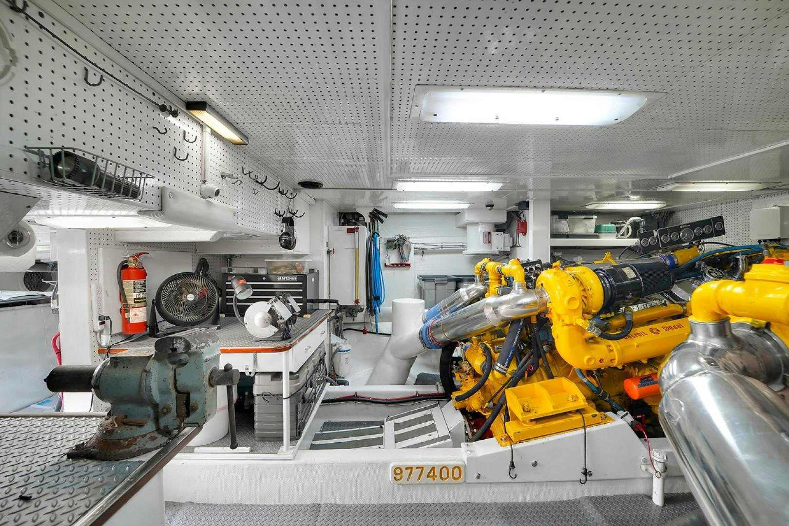 a large yellow machine aboard STEALIN TIME Yacht for Sale