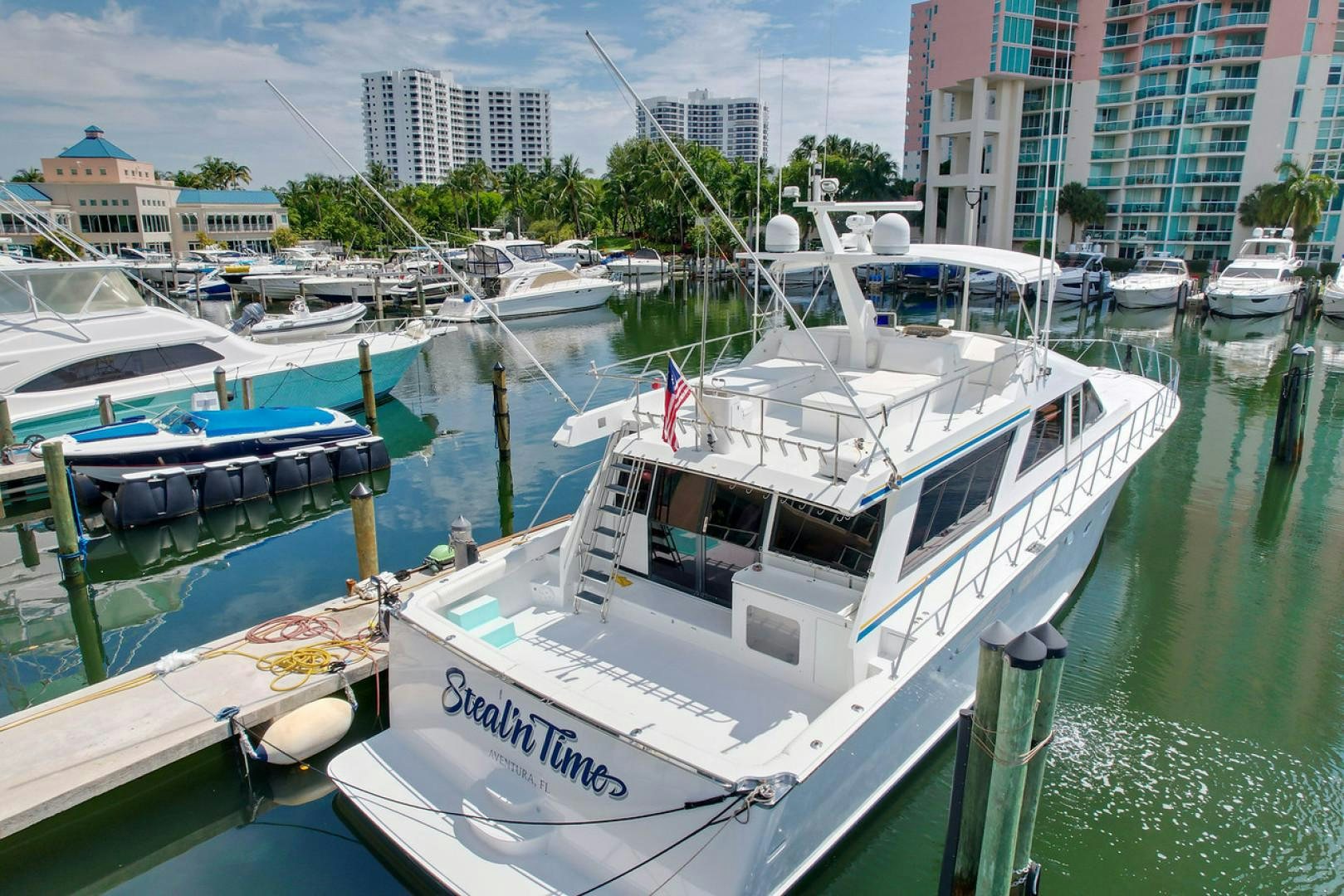 a group of boats are parked in a harbor aboard STEALIN TIME Yacht for Sale