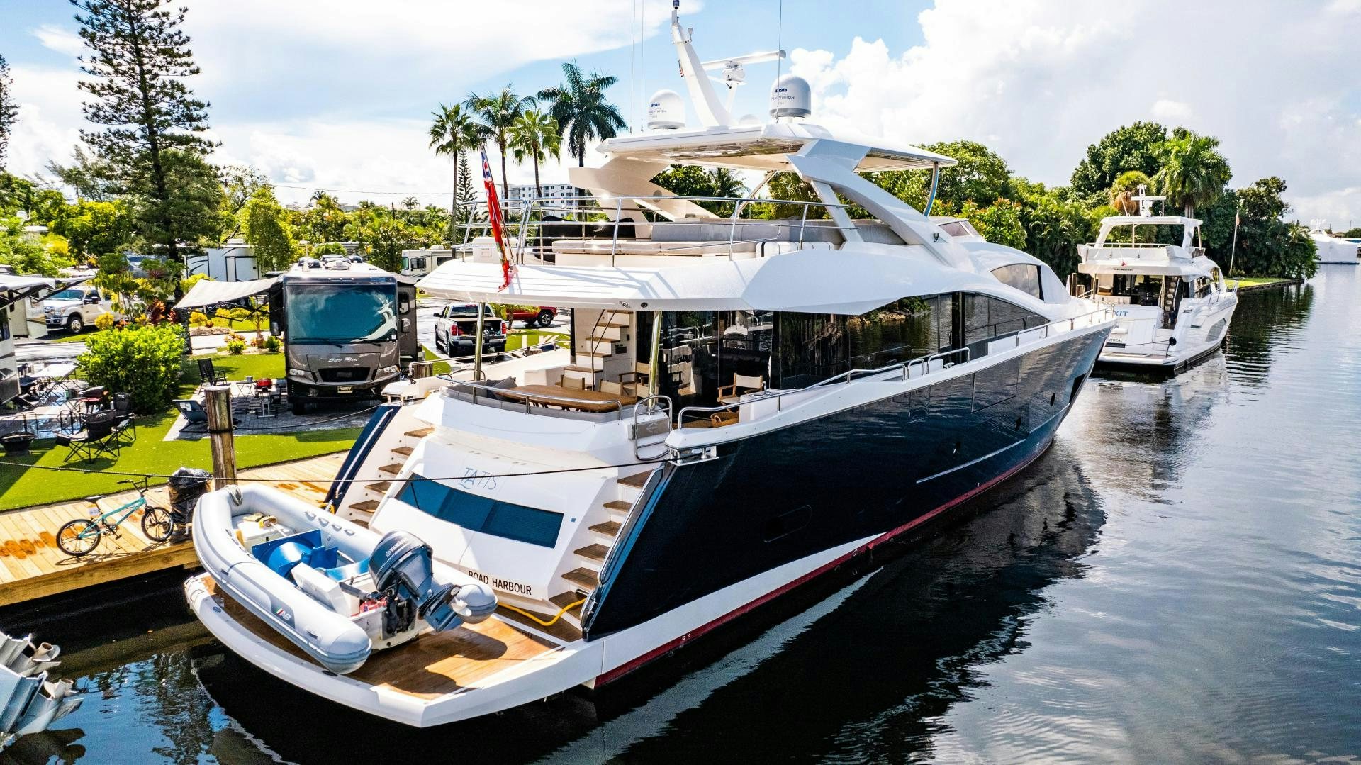 a boat docked at a dock aboard TATIS Yacht for Sale