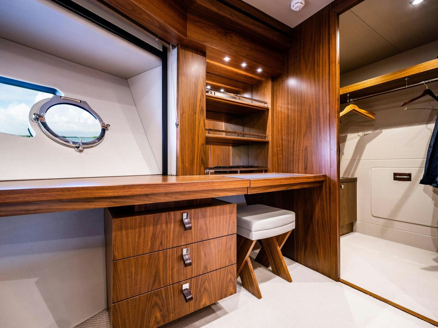 a room with a desk and a chair aboard TATIS Yacht for Sale