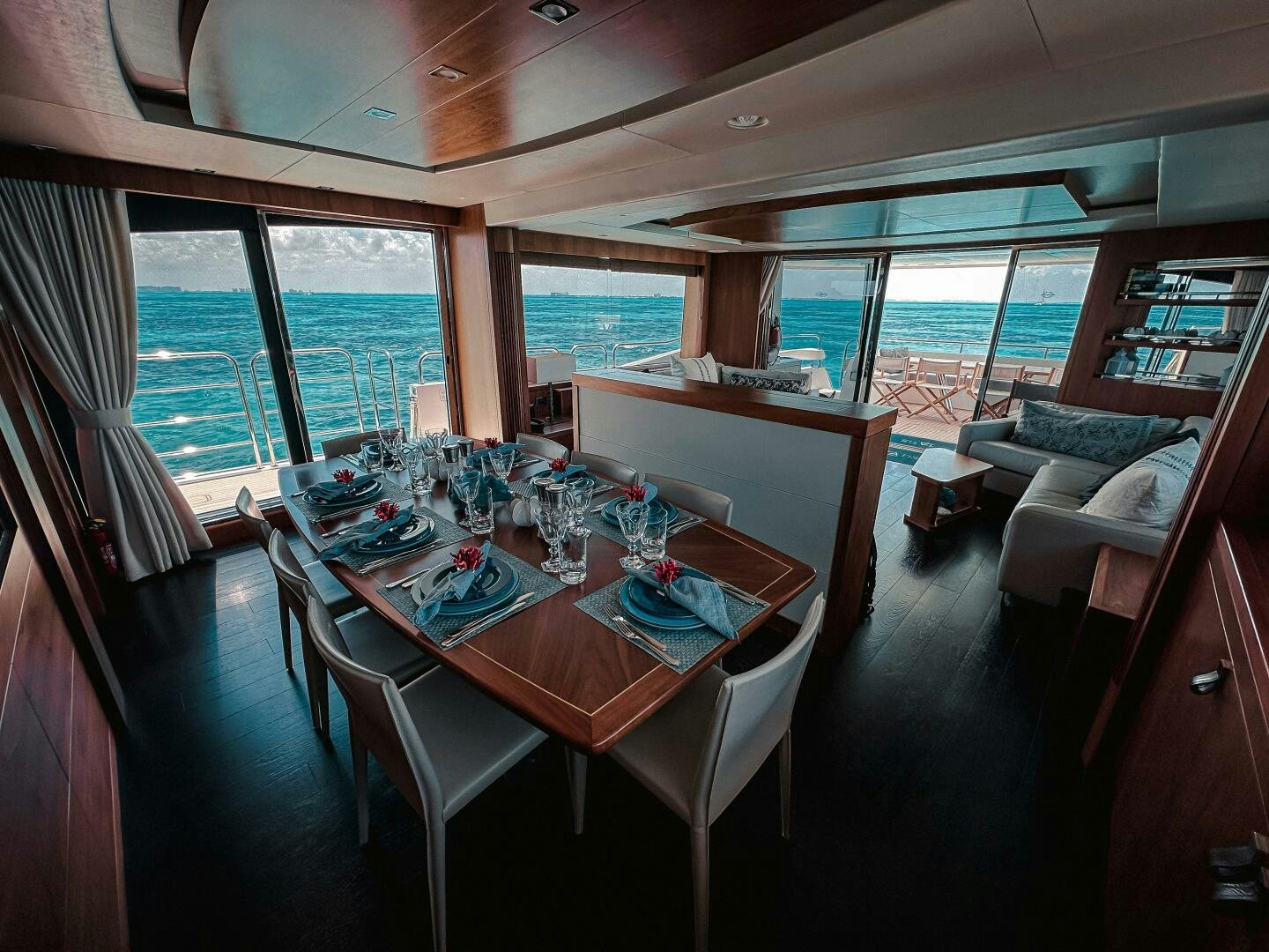 a dining table in a room aboard TATIS Yacht for Sale