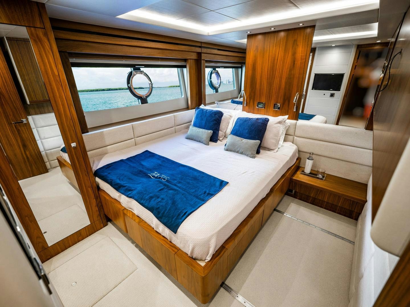 a bed in a room aboard TATIS Yacht for Sale