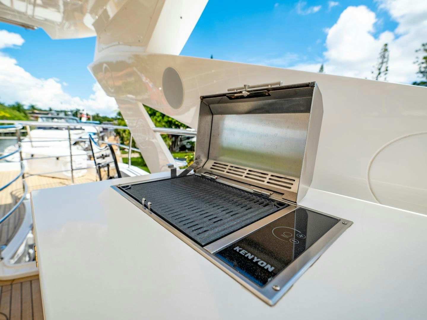 a laptop on a table aboard TATIS Yacht for Sale