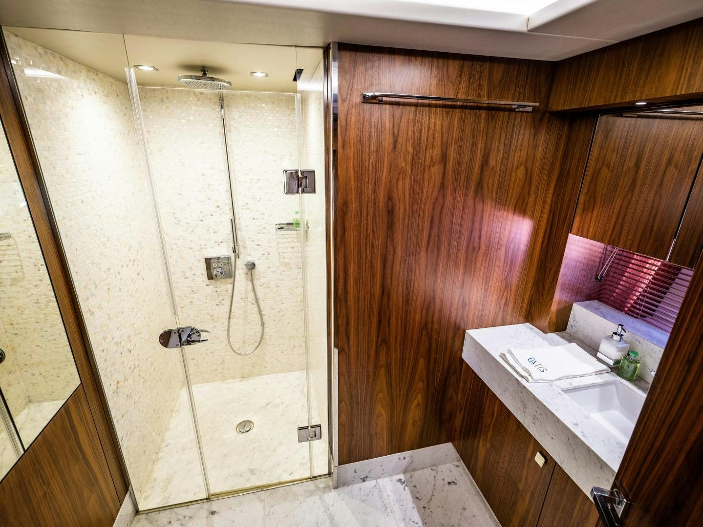 a bathroom with a shower aboard TATIS Yacht for Sale