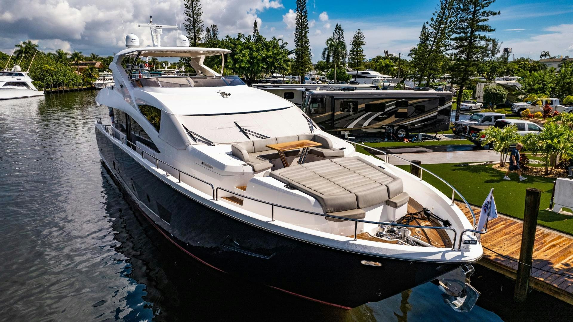 a boat docked at a pier aboard TATIS Yacht for Sale