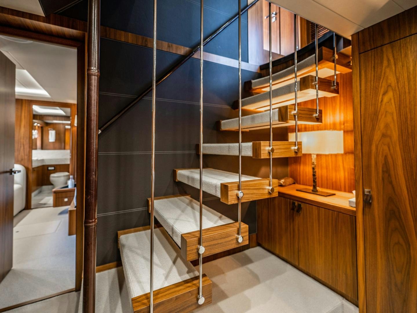 a bathroom with a glass wall aboard TATIS Yacht for Sale