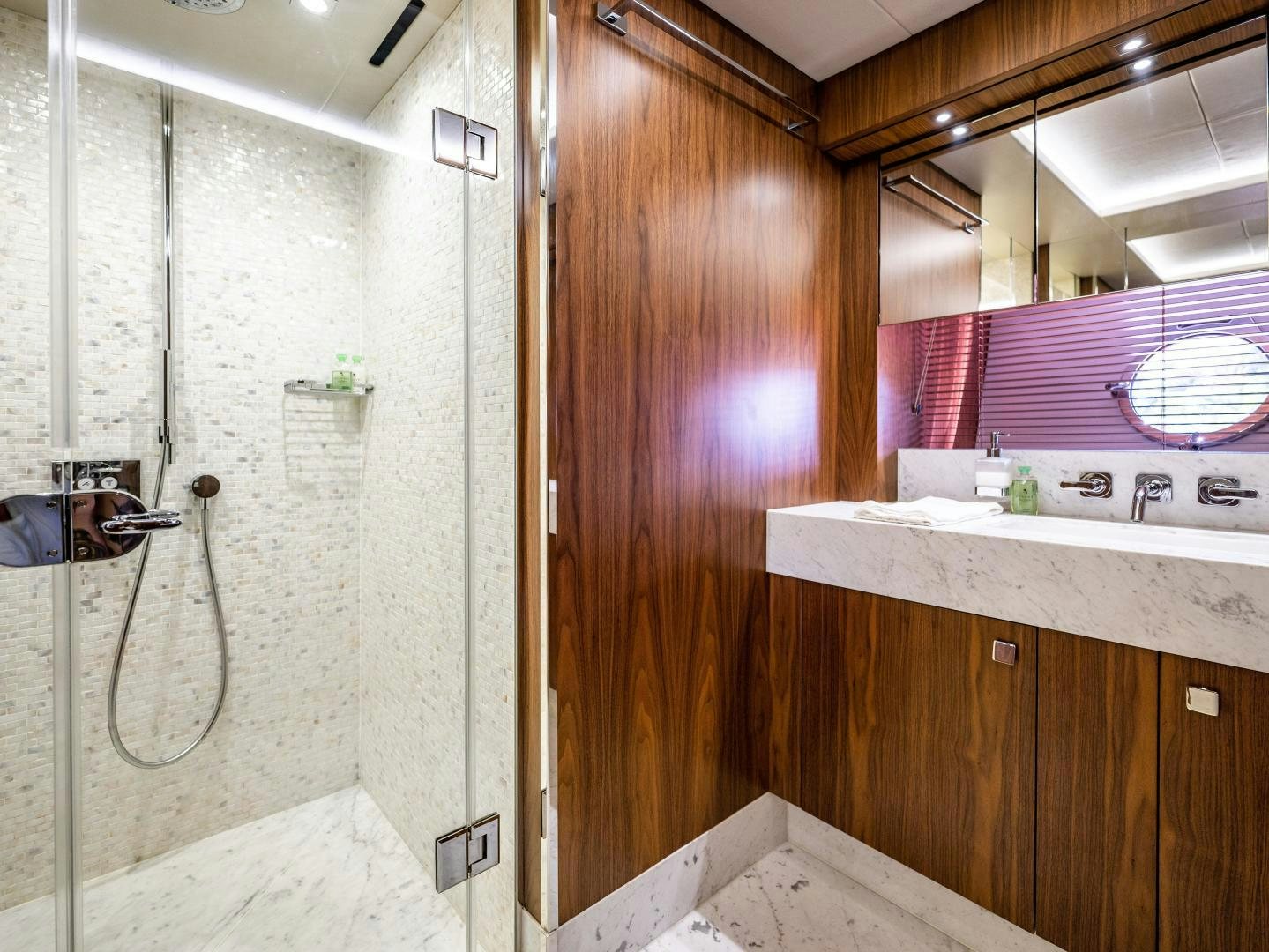 a bathroom with a shower aboard TATIS Yacht for Sale