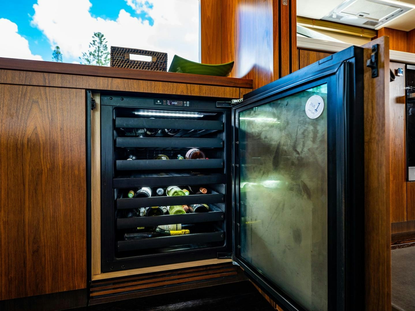 a refrigerator with a door open aboard TATIS Yacht for Sale