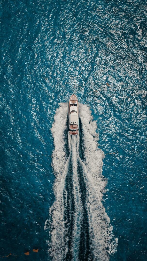 a rocket taking off from the ground aboard TATIS Yacht for Sale