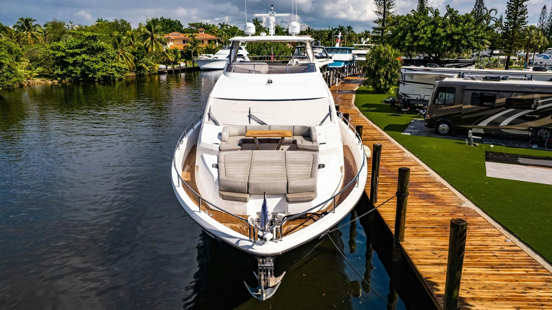 a boat docked at a pier aboard TATIS Yacht for Sale