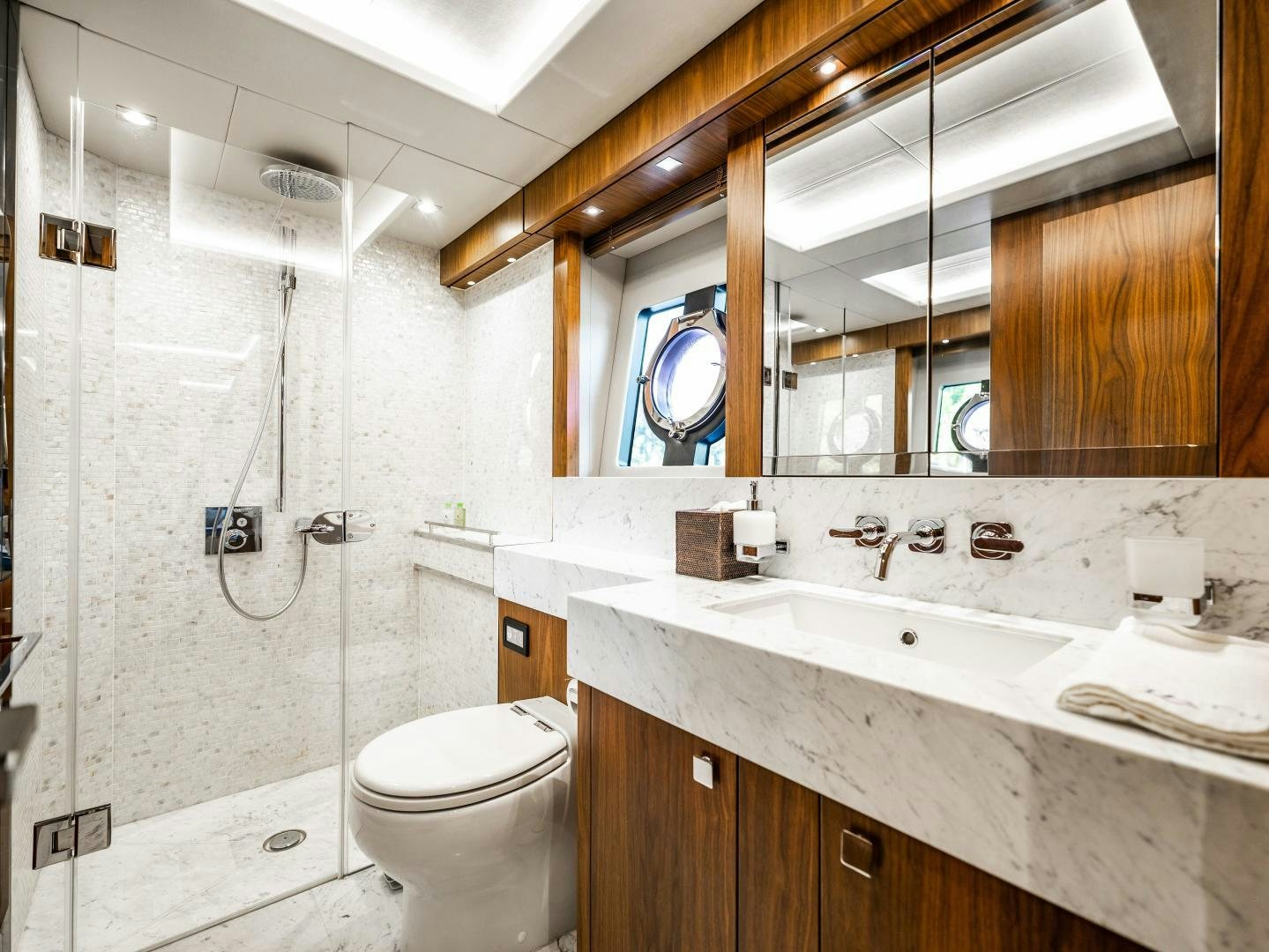 a bathroom with a sink and a toilet aboard TATIS Yacht for Sale