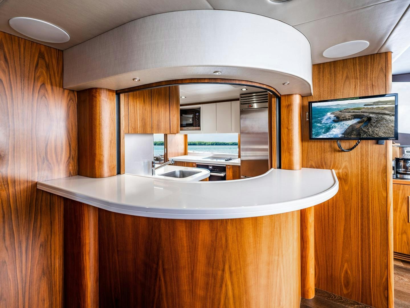 a bathroom with a large mirror aboard TATIS Yacht for Sale