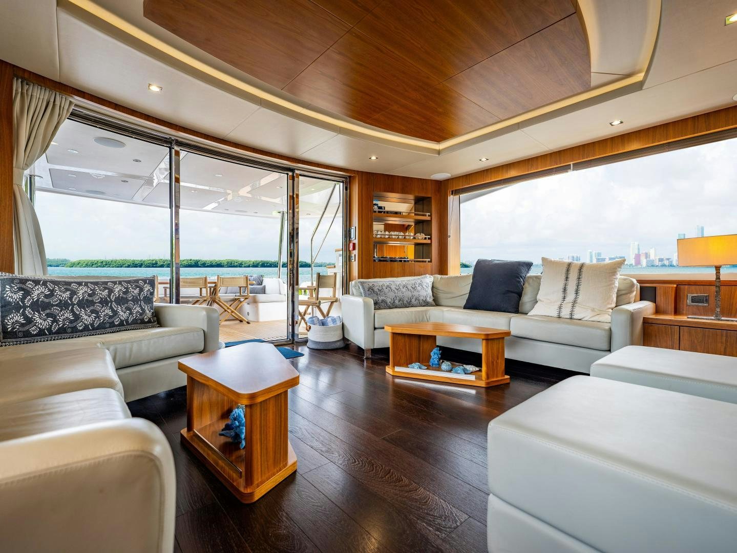 a living room with a large window aboard TATIS Yacht for Sale