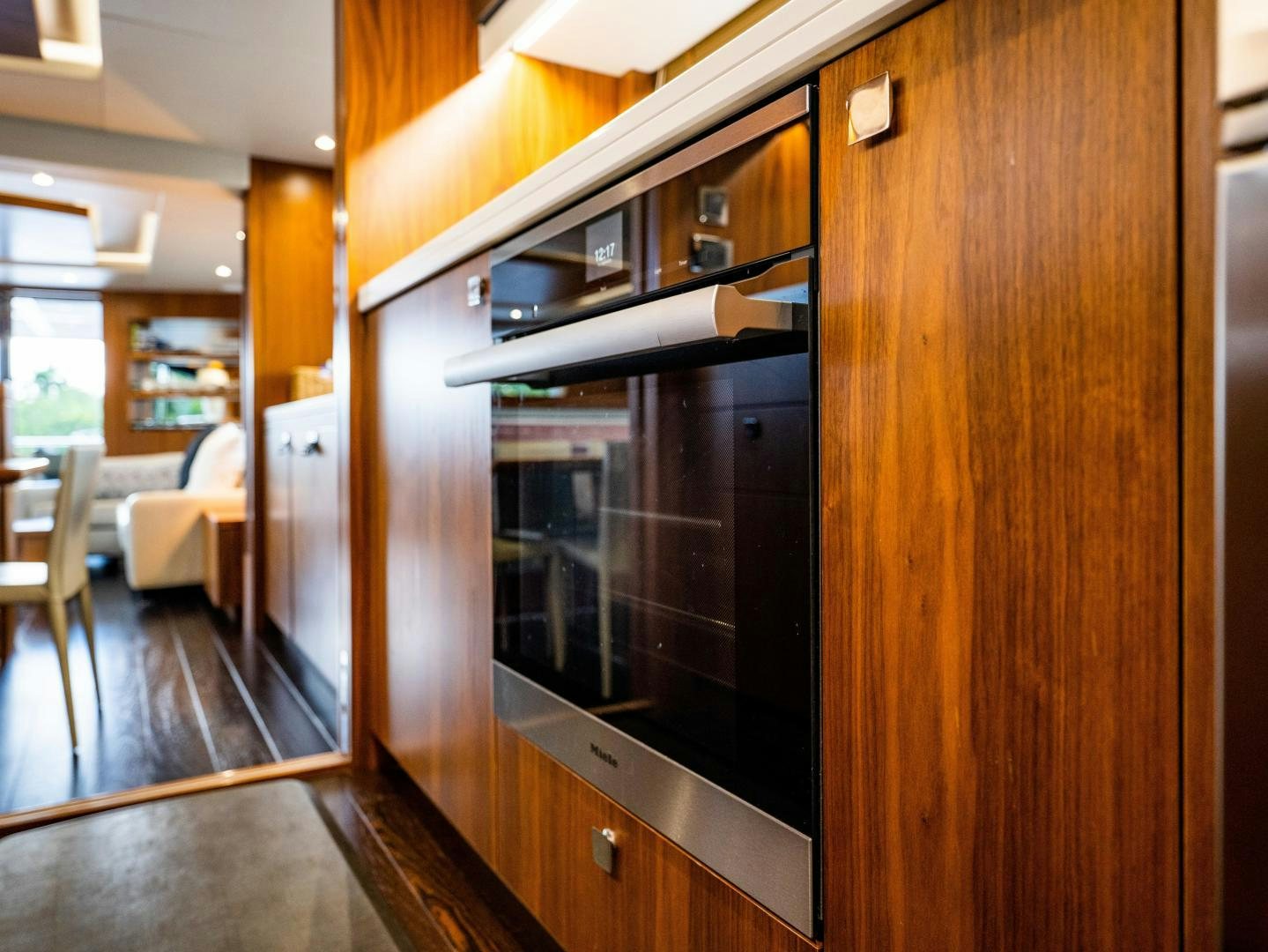 a wood cabinet in a room aboard TATIS Yacht for Sale