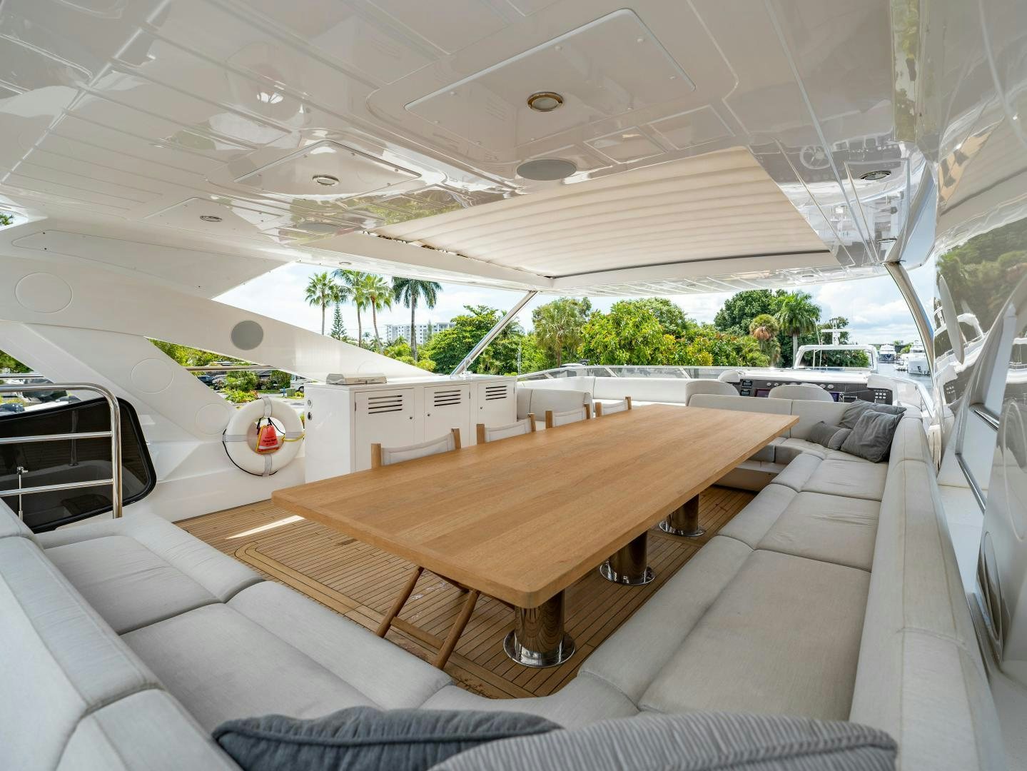 a room with a couch and a table aboard TATIS Yacht for Sale