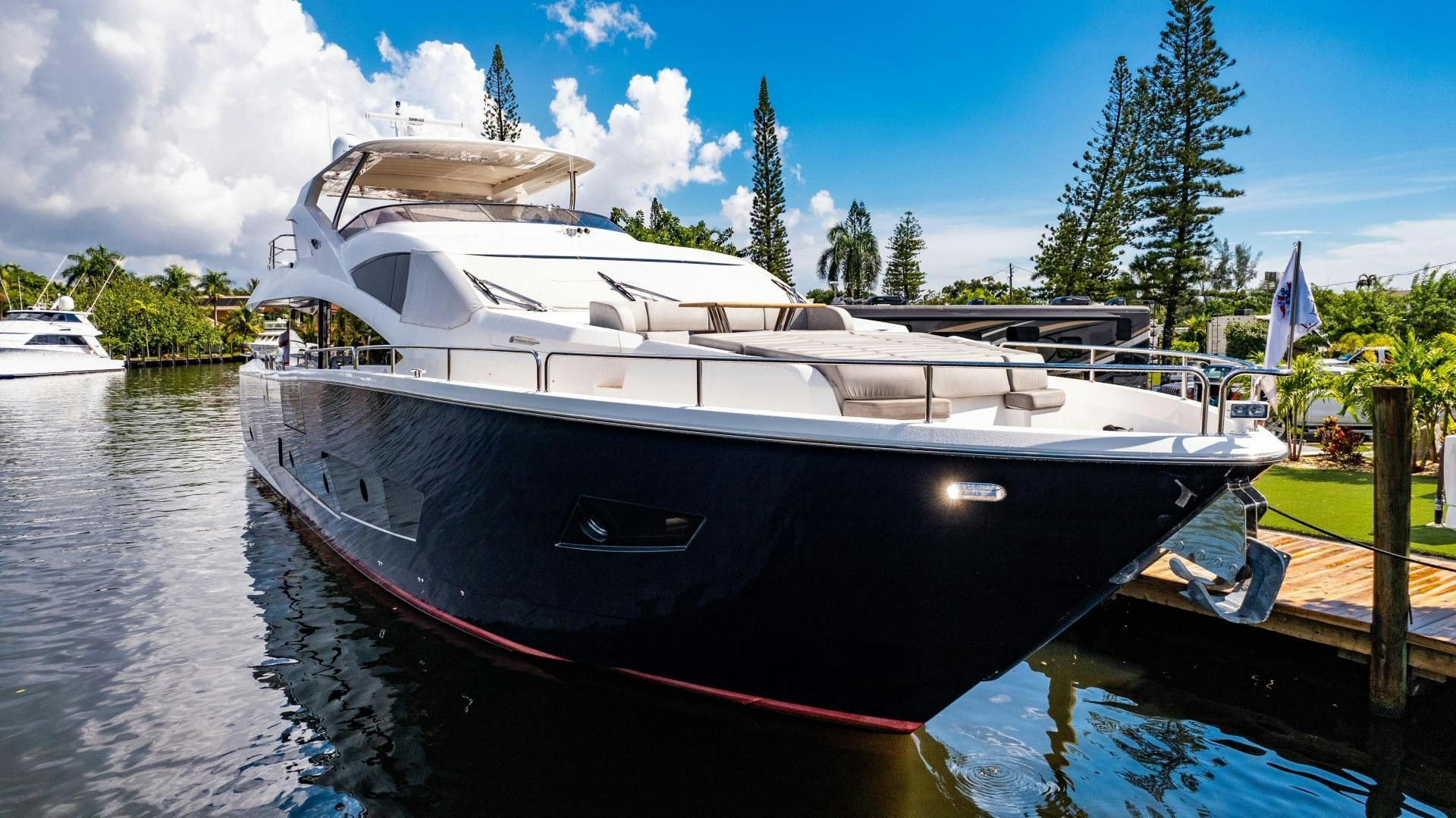 a boat docked at a pier aboard TATIS Yacht for Sale
